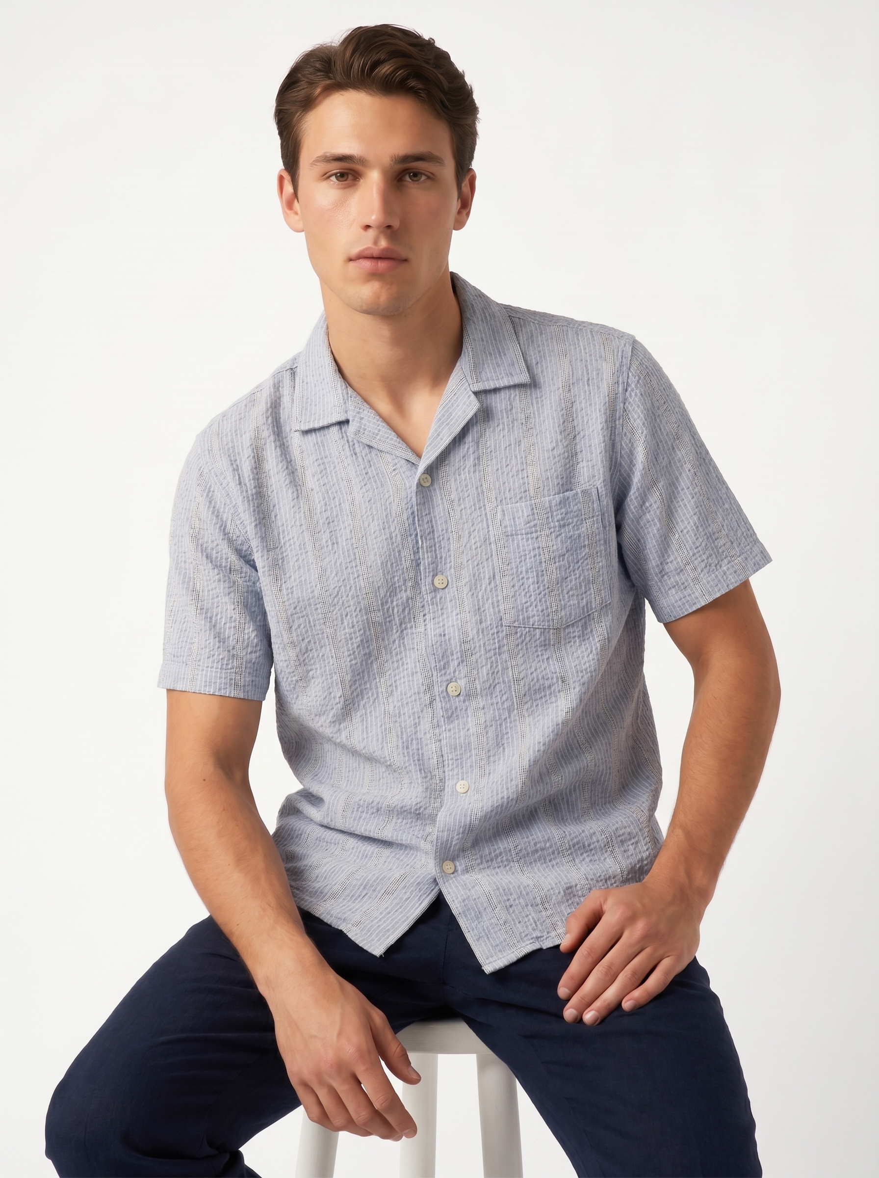 AI-generated on-model imagery — blue shirt